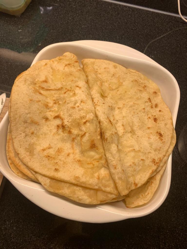 Plate with rotis, folded in half